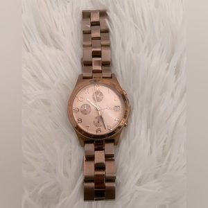 Marc Jacobs rose gold women’s watch.